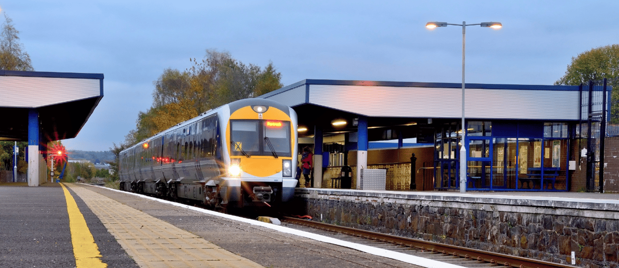 How Do Train Loyalty Schemes Impact Station Profitability?