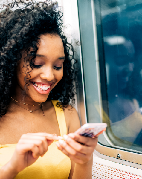 woman-on-train-checking-phone